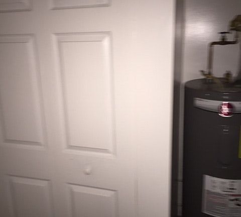 Extra closet by hot water tank