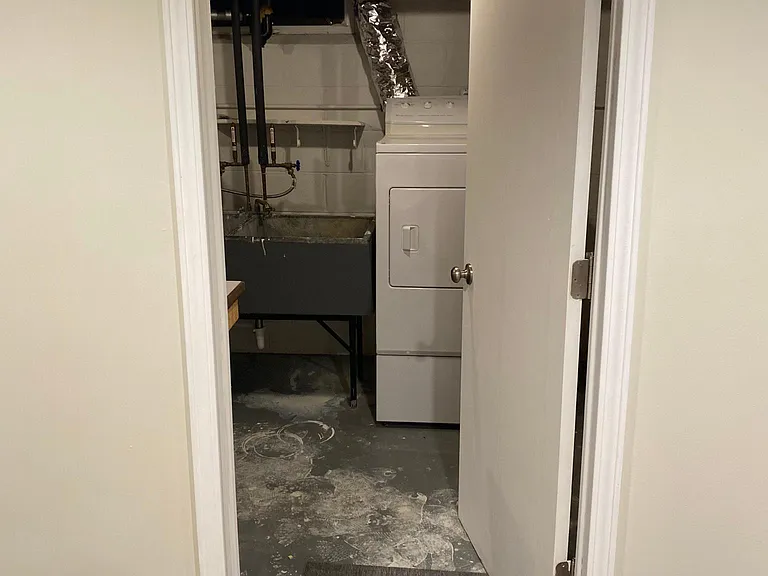 Door to utilities and washer dryer
