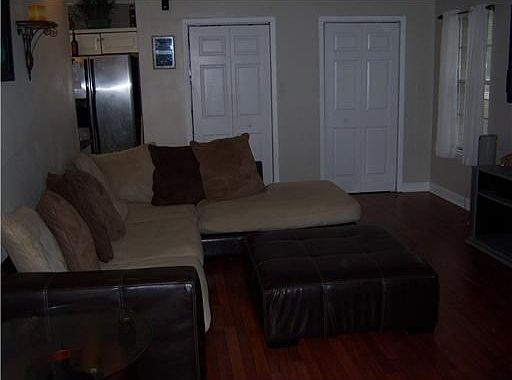 Living room into kitchen, large pantry