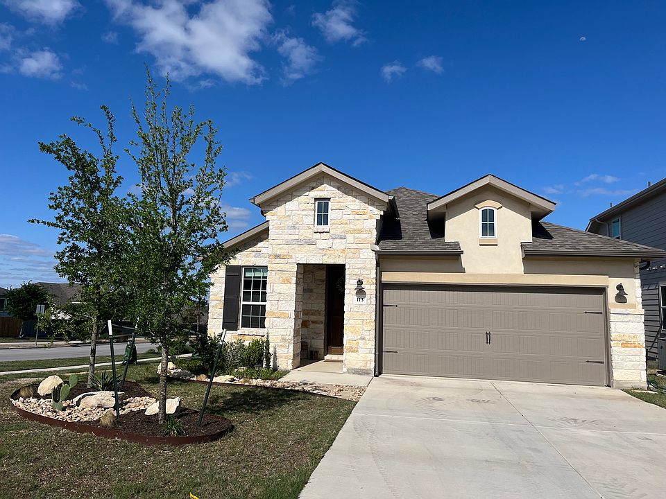 Premium corner lot with beautiful landscaping features for extra curb appeal