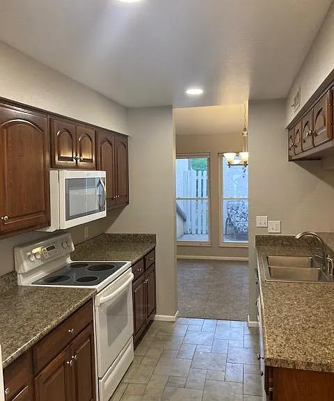 Ample counter space, oven, stove, microwave, double kitchen sink