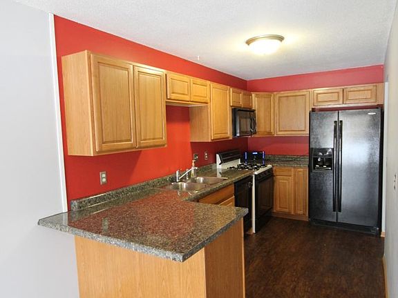 Kitchen with new cabinets, countertops and floors!