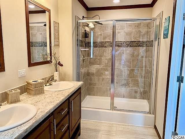 Double Sink and Tiled Shower