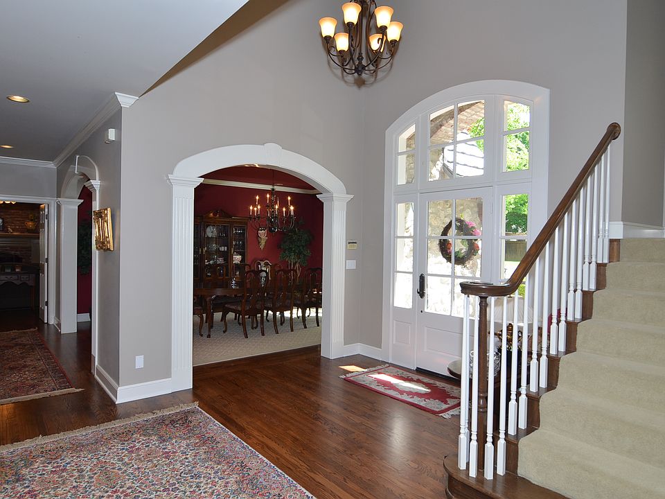 Two Story Entry With Wood Floor
