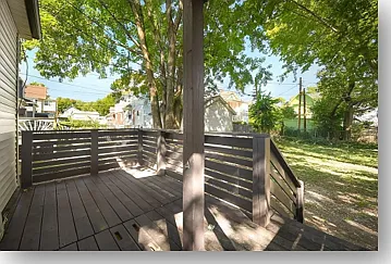 Spacious deck for dining and summer evening fun.