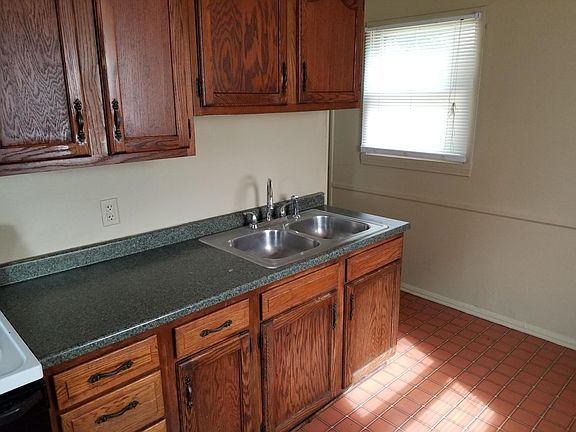Galley kitchen..room for breakfast table and chairs