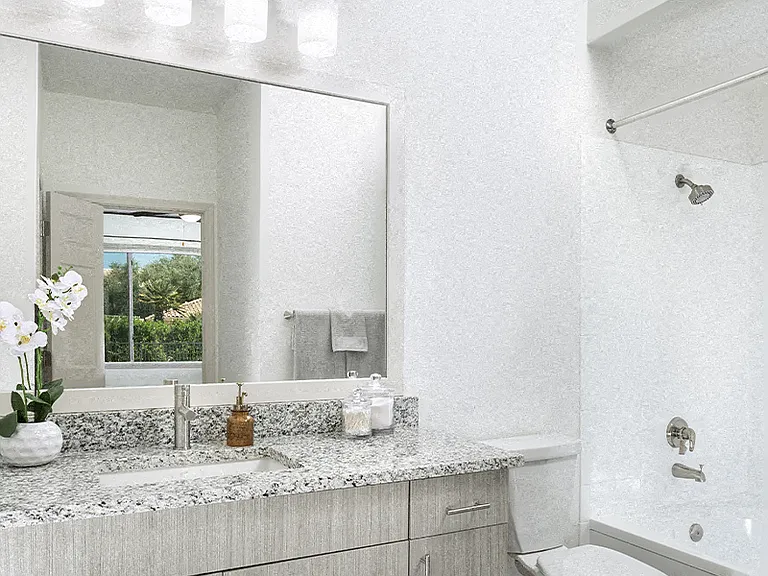 Bathrooms feature brushed nickel hardware and rectangular undermount sinks