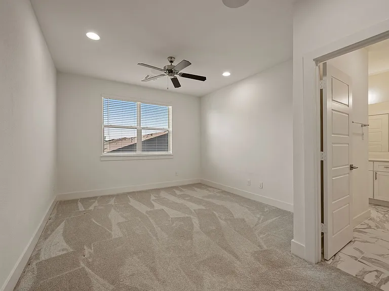 Master bedroom with en suite master full bathroom with walk in closet off master bathroom