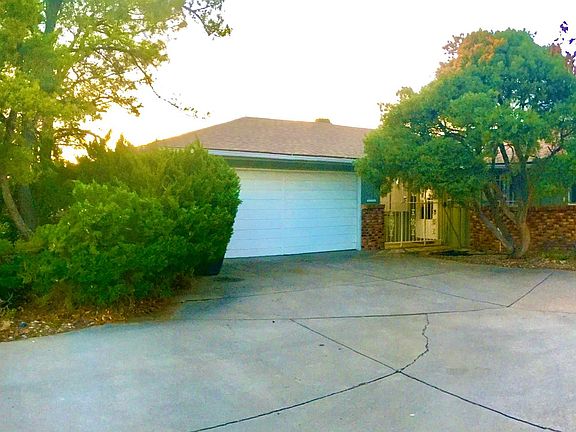 Front driveway and entrance to right of garage.