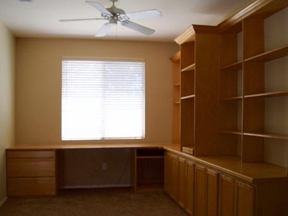 Loft with built- in cabinets