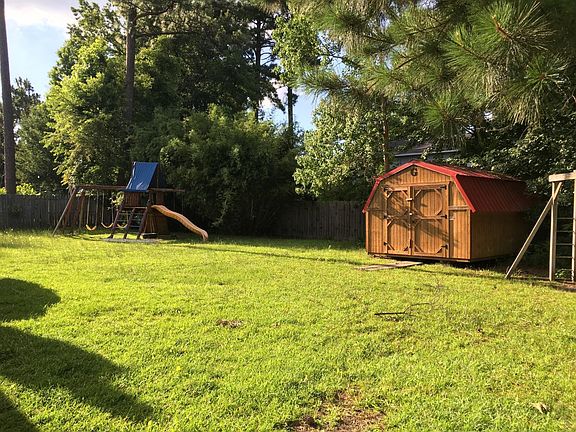 back yard with Storage and swing set included
