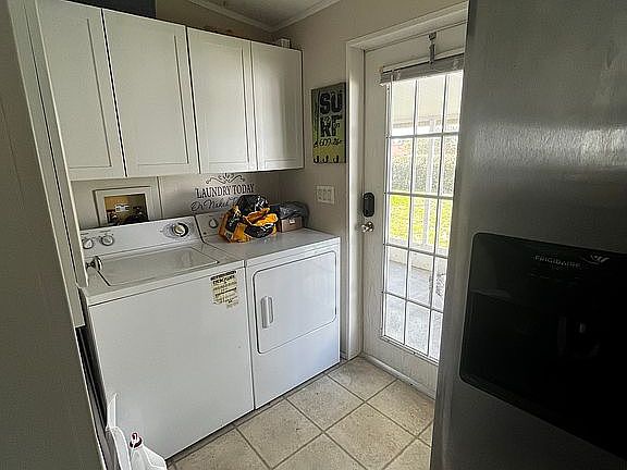 Washer dryer by back door 