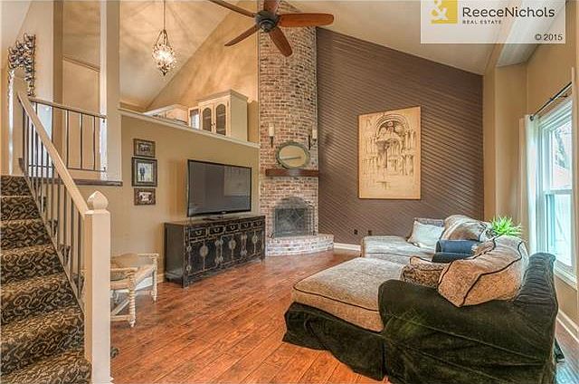 Welcome home to this incredibly updated front/back Split level home!  Dramatic two-story fireplace and soaring vaulted ceilings.