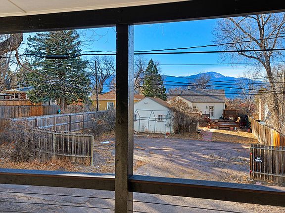 The mountain view from your large deck. Sit outside and watch the world pass by.