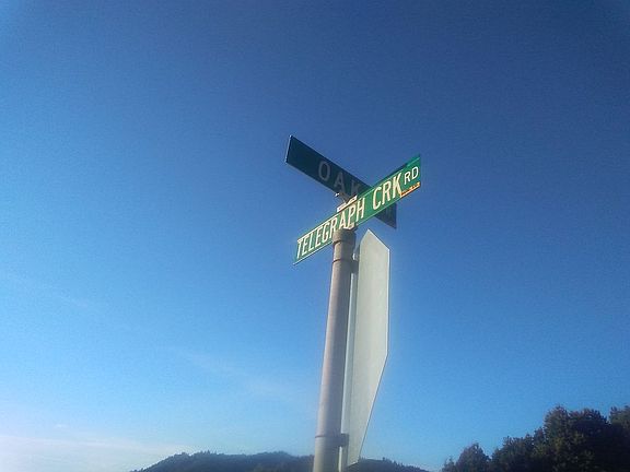 Telegraph Ck Rd & Oak Rd Sign