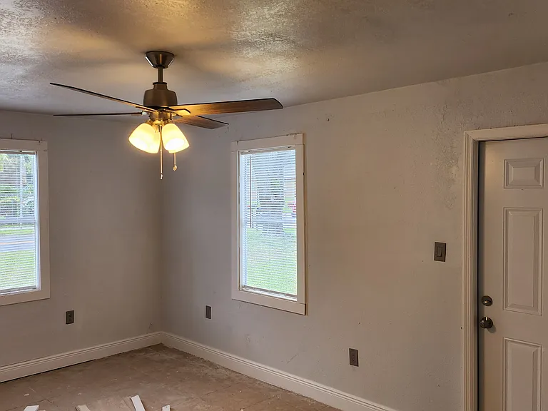 Huge bedroom #3, Den, Family, make it your own- behind (barndoor) with ceiling fan and own entry door