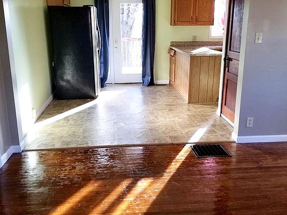 Dining Area with Stainless Steel Refrigerator