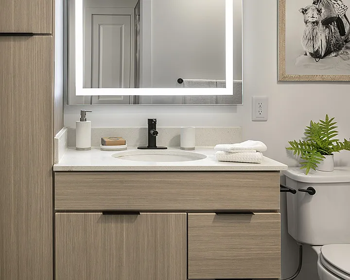 Apartment Bathroom with LED vanity mirror.