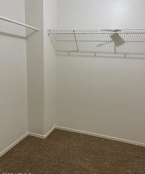 Large walk in closet in primary bedroom