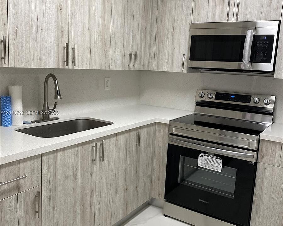 1st image of 6190 W 19th Ave APT 206