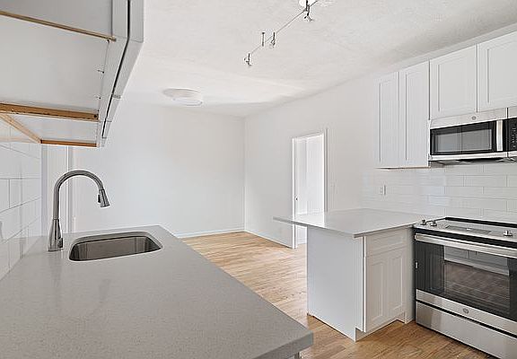 3rd image of 332 E 4th St APT 55