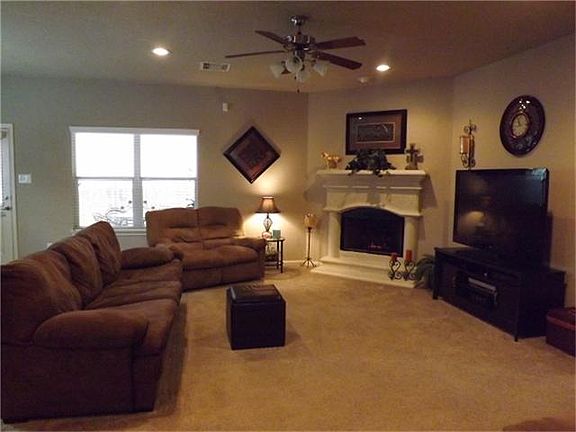 Family room is open to kitchen and breakfast area.
