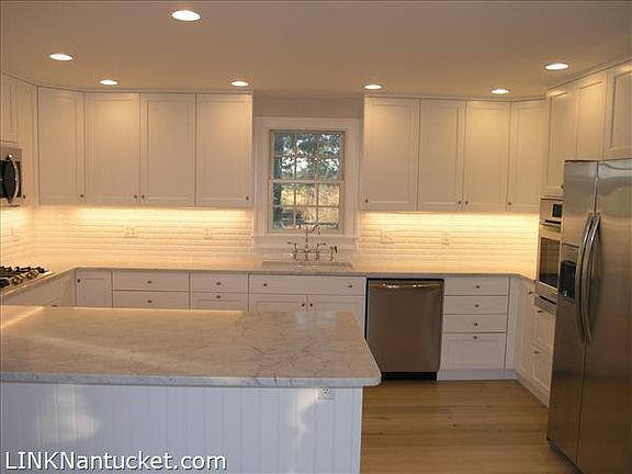 Carrera Marble counter tops and island.