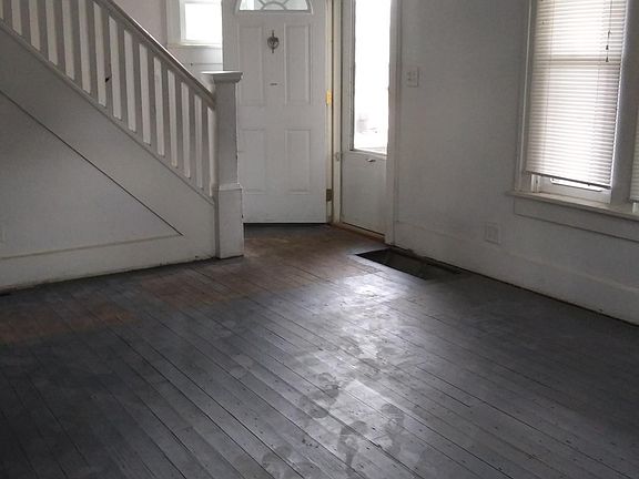 Front door entrance, floor is all painted grey now.