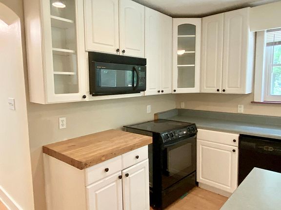 Kitchen with Electric Range and Microwave