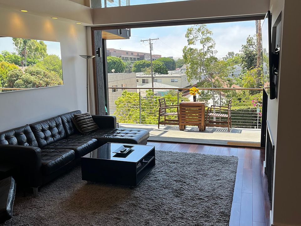 Living room with window wall open