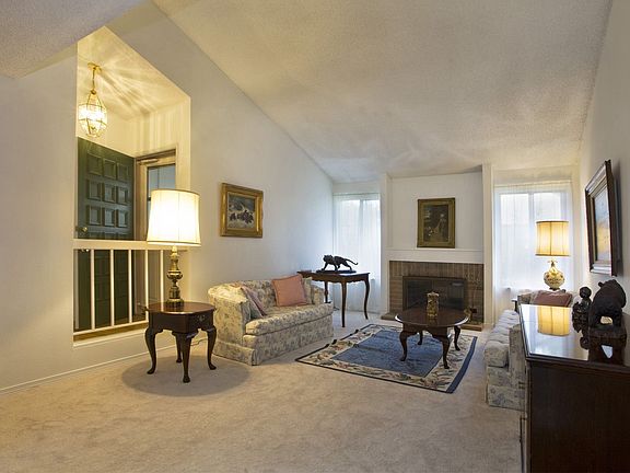 Living room with vaulted ceiling