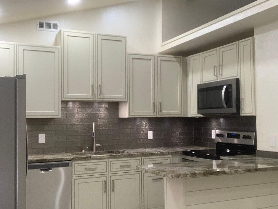 Kitchen With Storage Loft Above
