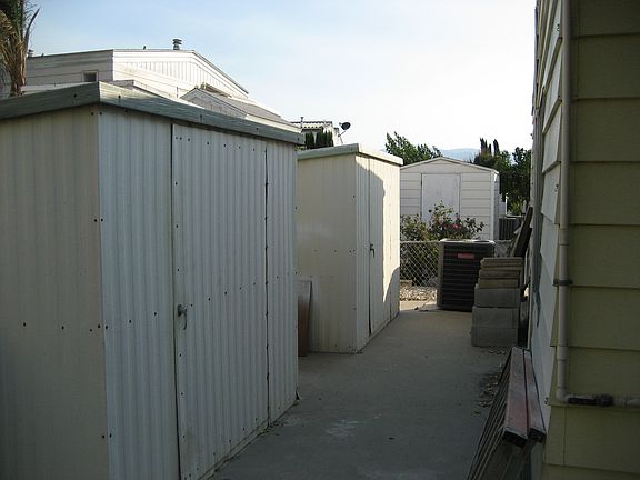 Storage sheds in back of hou
