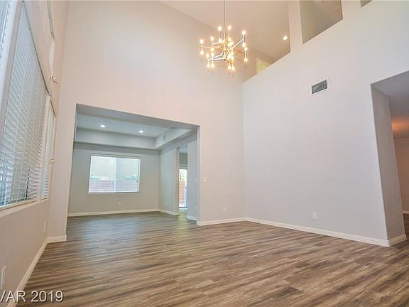 Dramatic high ceilings in living room!