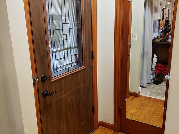 Front door and coat closet