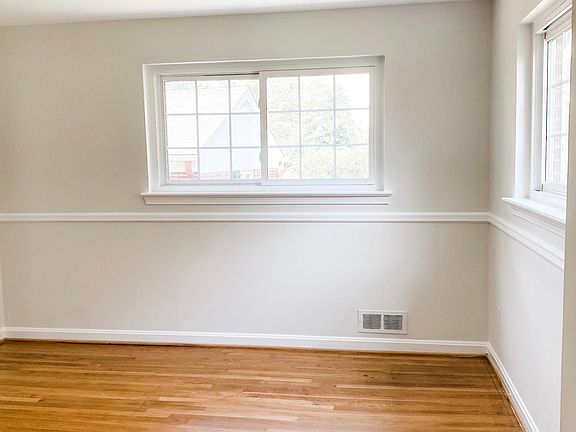 Dining room with two windows.