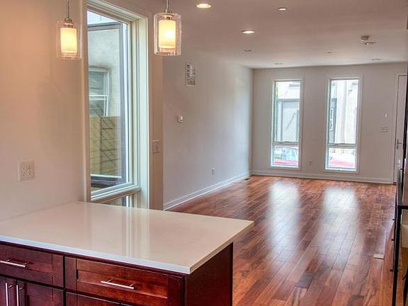 Open-concept layout between kitchen and living and dining areas. Perfect for entertaining