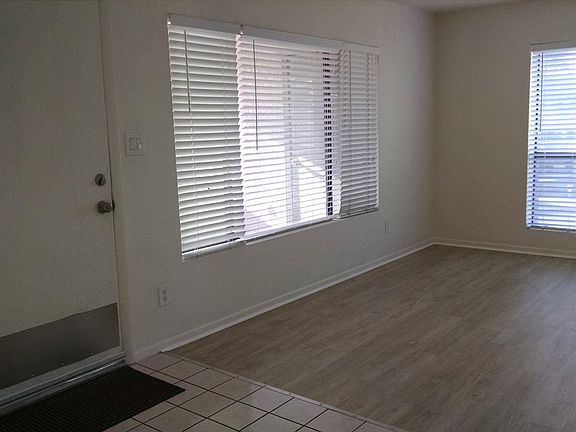 LR-new luxury vinyl plank. Bright space.