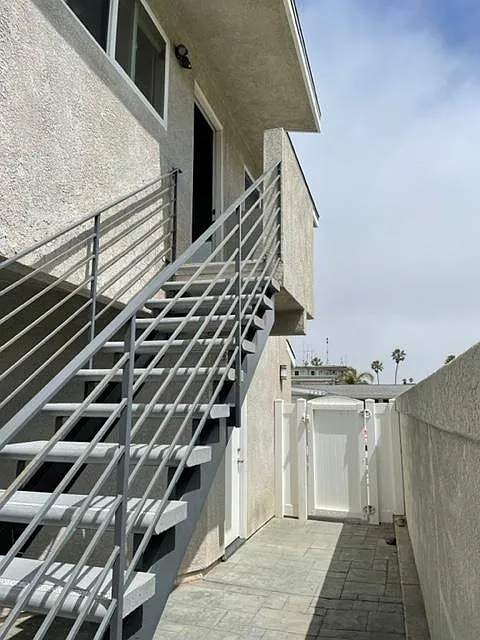 Private access to interior courtyard from garage plus entry to second floor apartment