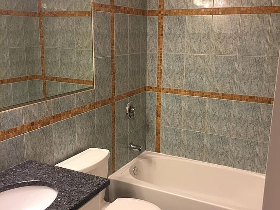 Beautiful Master Bathroom with Granite throughout