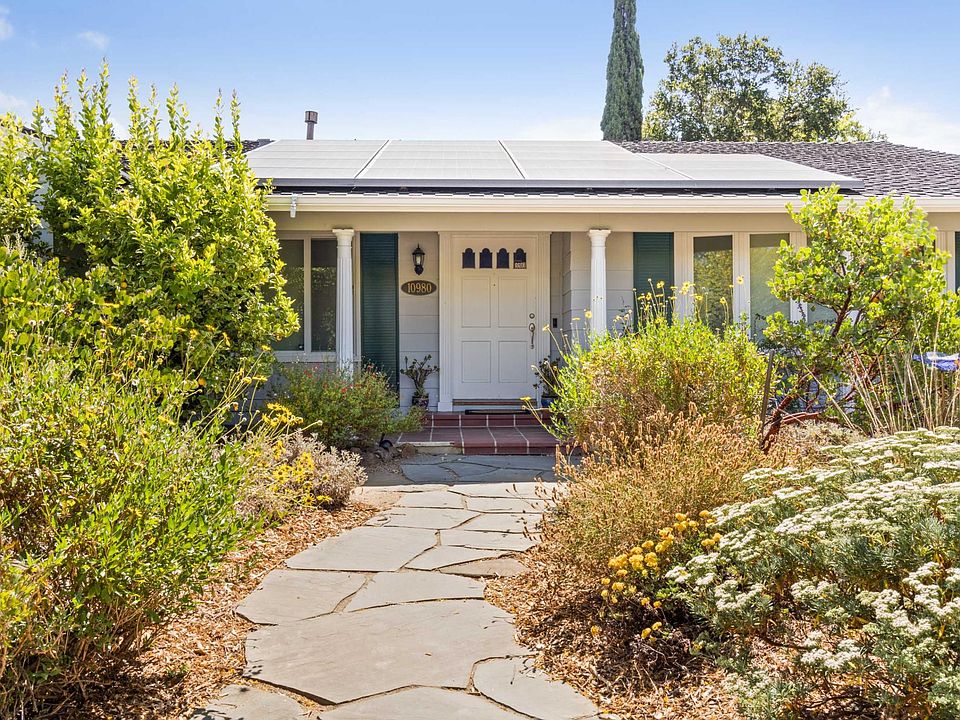 Charming colonial with professionally designed native garden and solar panels