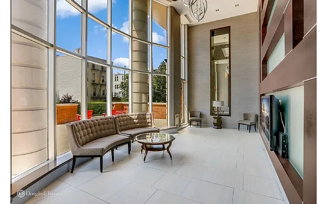 Sold by Douglas Elliman | media 18
