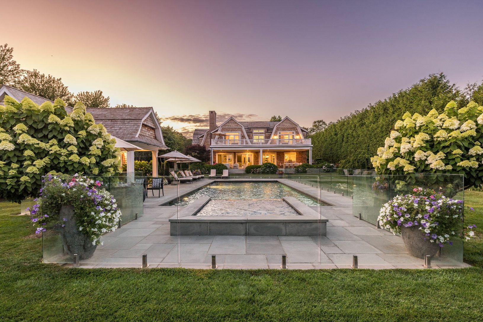 Twilight falls and the house glows