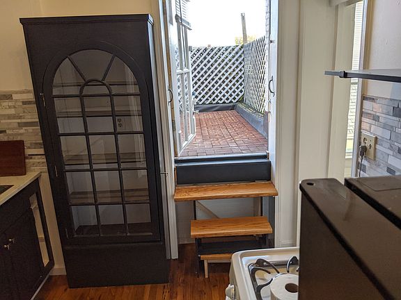 View from kitchen, showing roof deck access.