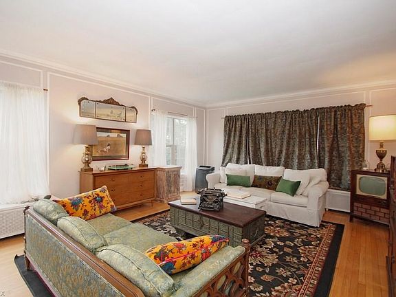 Another view of the living room, facing the front windows.