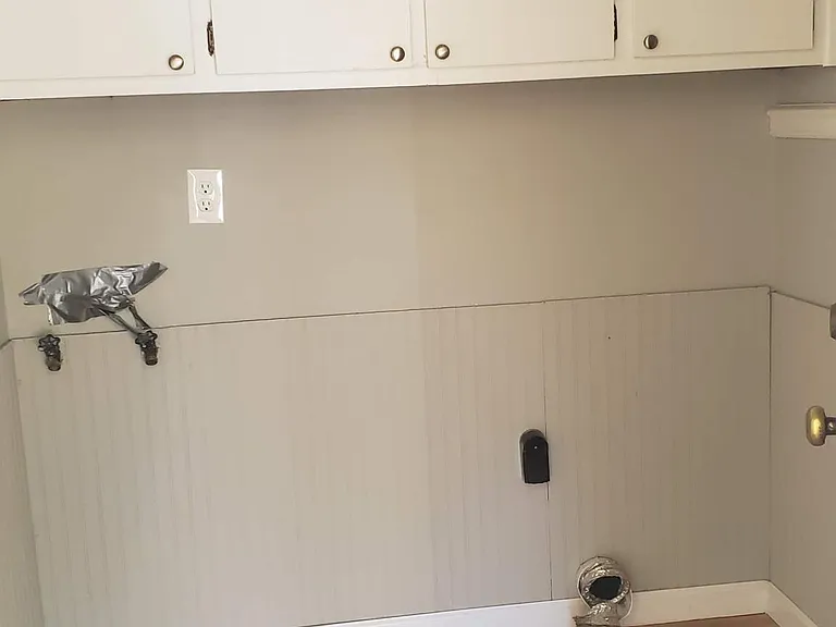 Washer/Dryer Hookup area (located immediately upon back door/carport entrance).
