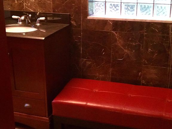 Yep, that is a bench in the partial to wait on for your gatherings!