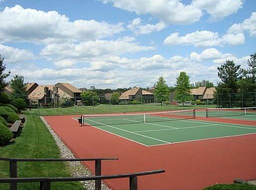 tennis courts adjacent to pool