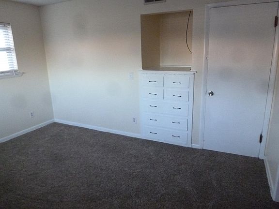 Master has built in drawers with TV nook above