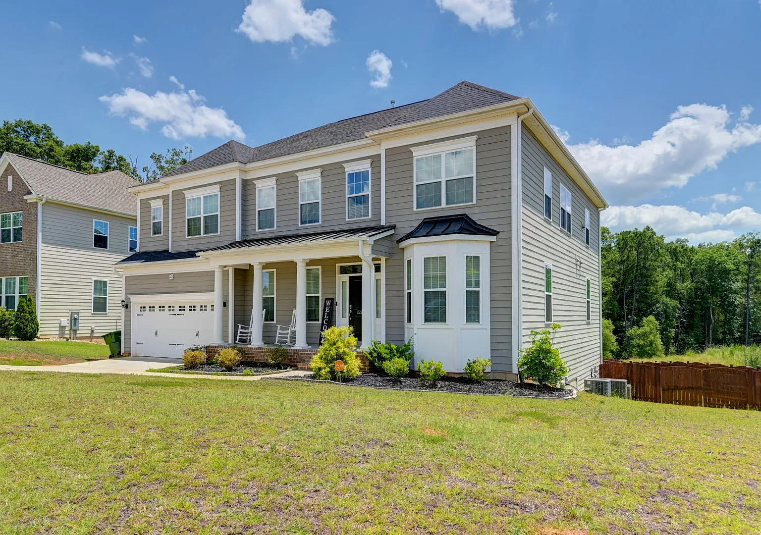 Welcome to 2286 Harvestwood Lane, a luxurious 5-bedroom, 4.5-bath home nestled in the serene comm... — Photo 2